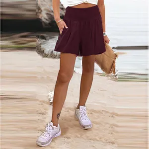 Vista dettagliata dei pantaloncini casual a vita alta elastici tinta unita estivi.