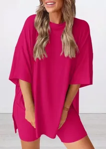 Detail view of women solid fuchsia loose short sleeve top and shorts lounge set for summer.