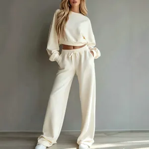 Casual solid cropped sweatshirt and wide leg pants set, minimalist comfortable lounge outfit.