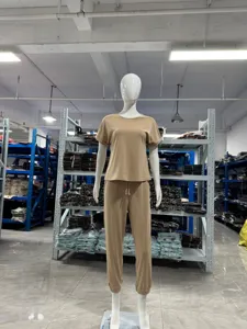 Detailed view of the solid color short sleeve top and jogger pants casual lounge set.