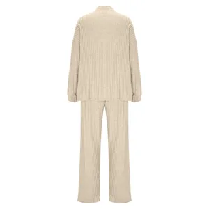 Casual ribbed knit loungewear set in beige, featuring a long-sleeve top and trousers.