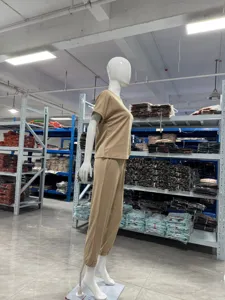 Solid color casual short sleeve top and pocket sweatpants set for women daily wear.