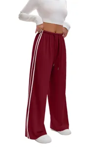 Comfortable women casual loose wide leg sweatpants featuring dual side stripes and drawstring waist.