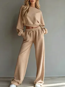 Detailed view of the casual solid color cropped sweatshirt and wide-leg trousers set.