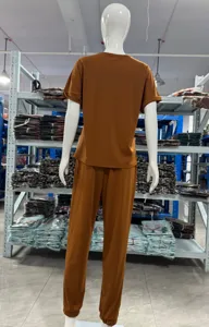 Solid color short sleeve top and pants lounge set detail view, casual women clothing.