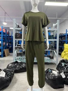 Casual solid color short sleeve top and jogger pants set for women, comfortable daily wear.