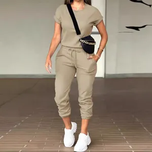 Casual solid color womens two piece outfit short sleeve top and pocket sweatpants detail