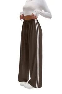 Women casual loose wide leg sweatpants with drawstring and stylish double side white stripes.