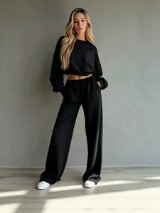 Minimalist solid color crop sweatshirt and wide leg pants set for women, cozy casual style.