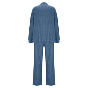 Blue ribbed loungewear set detail view, featuring long sleeve top and pants for cozy comfort.