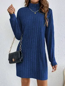 Detail view of the solid color turtleneck long-sleeve knit dress, showing ribbed texture and fit.