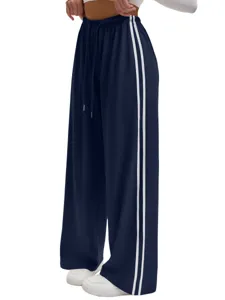 Details of casual loose wide-leg yoga pants with contrast side stripes and comfortable drawstring.
