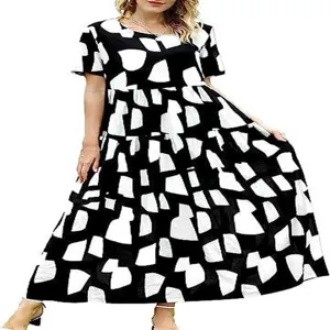 Black and white abstract print short sleeve tiered maxi dress detail view for summer wear.