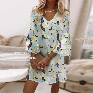 Women floral print mini dress V-neck 3/4 sleeve casual summer dress chic style detail view.