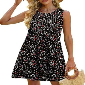 Detail view of the floral sleeveless mini dress, featuring chest pleats and lightweight fabric.