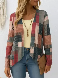 Close-up detail of the geometric printed long sleeve cardigan and inner top worn by model.