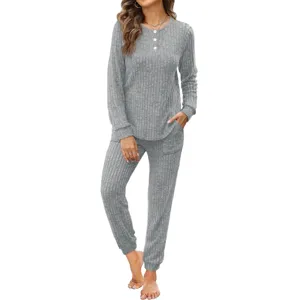 Women's ribbed casual two-piece lounge set with button-up long sleeve top and pants.