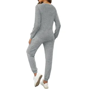 Ribbed knit two-piece lounge set back view, detailed texture and casual style pants and top.