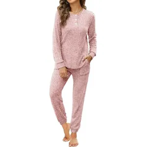 Pink ribbed loungewear set detail, long sleeve top and pants with pocket, soft knit fabric.