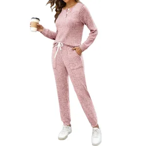 Detailed view of women's ribbed two-piece casual loungewear set with button top and pocket pants.