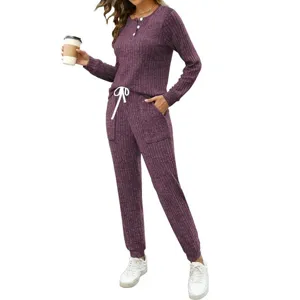 Detailed view of the women's ribbed two-piece lounge set, featuring button top and pockets.
