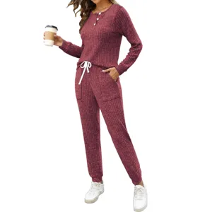 Detailed view of women casual two piece ribbed long sleeve top and jogger pants set in burgundy.