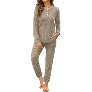 Ribbed knit two piece loungewear set featuring button-up long sleeve top and pants.