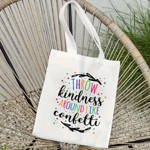 Canvas tote bag with inspirational letter print, stylish and durable reusable shopping bag.