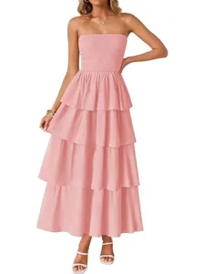Pink strapless tiered maxi dress for women, smocked bodice and layered ruffle design.
