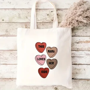 Canvas tote bag with heart pattern for women, stylish reusable shopping bag for daily use.