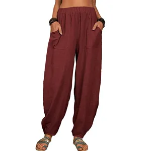 Pantalon sarouel ample et confortable en coton et lin avec taille élastique et poches.