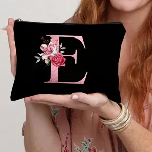 Black canvas makeup bag featuring large letter E with elegant pink floral rose design.