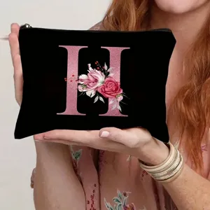 Canvas makeup bag with rose gold initial letter H and floral design, perfect for daily travel storage.