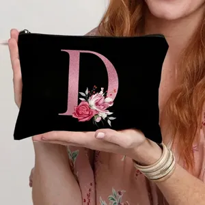 Canvas cosmetic pouch with pink glitter letter D design, handy storage bag for daily use.