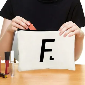 Canvas cosmetic bag with letter F print, portable zipper travel makeup storage pouch.