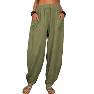 Pantalon sarouel décontracté en coton lin ample pour femme avec grandes poches taille élastique.