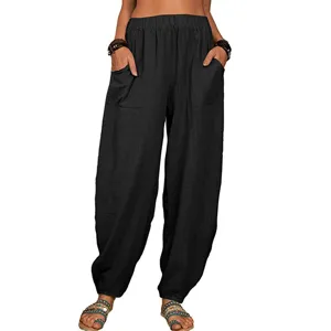 Pantalon harem noir ample et decontracte avec taille haute elastique et poches laterales.