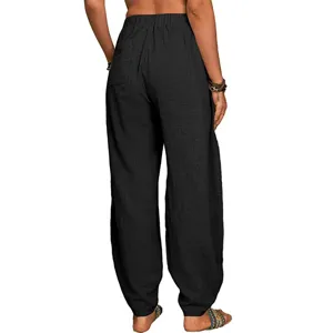 Pantalon harem décontracté en lin noir, vue arrière montrant coupe ample et taille haute.