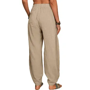 Pantalon harem décontracté ample en coton lin pour femme vue arrière avec détail de poche.