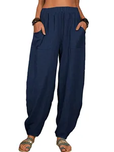 Pantalon sarouel décontracté en lin pour femme bleu foncé avec poches pour un usage quotidien.
