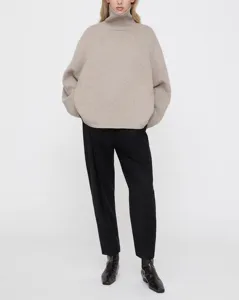 Women's cozy loose fit high turtleneck knit wool sweater, perfect for autumn and winter.