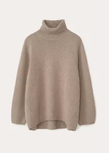 Discover this cozy women's turtleneck sweater featuring fine knit texture and warm wool blend.