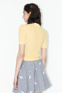 Women short sleeve knit polo sweater with grey floral skirt for spring summer daily wear.