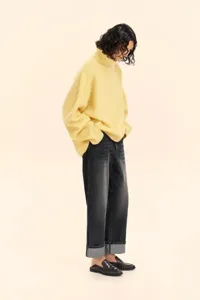 Women loose yellow turtleneck knit sweater, stylish autumn winter long sleeve pullover jumper top.