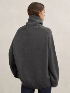 Women dark gray loose turtleneck knit sweater back view detail, soft winter warm pullover.