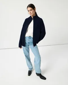 Detailed view of the women high-neck full-zip ribbed knit cardigan in dark blue style.