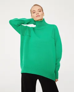 Casual loose fit turtleneck sweater in vibrant green color for women autumn winter daily wear.