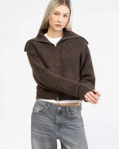 Detail view of stylish dark brown zip-up knit sweater with large collar and metal zipper.