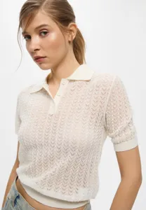Cream short sleeve lace knit polo sweater detailed view, soft texture and elegant collar style.