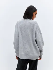 Grey turtleneck oversized knit sweater detail back view, cozy autumn winter pullover apparel.